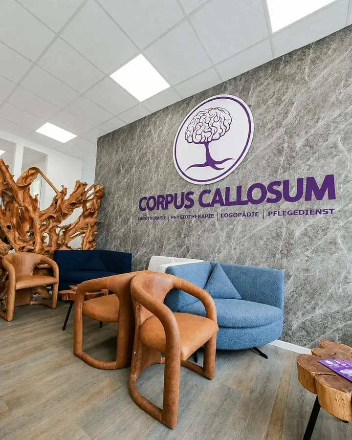 Reception with the Corpus Callosum logo wall on Schützenstraße